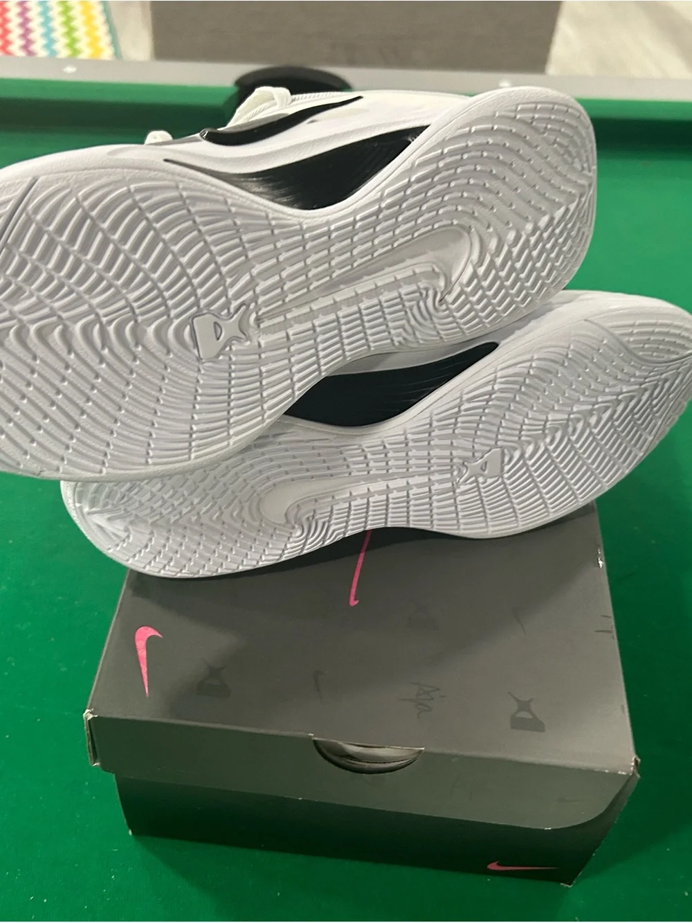 Nike Kids White Sneakers with Black Swoosh Accent